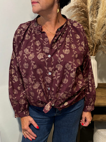 Chemise à détails dorés