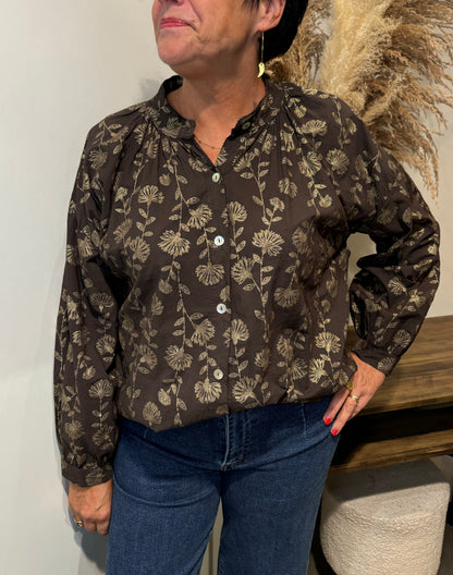 Chemise à détails dorés